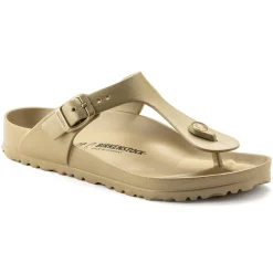 Shop Birkenstock Gizeh Essentials Glamour Gold