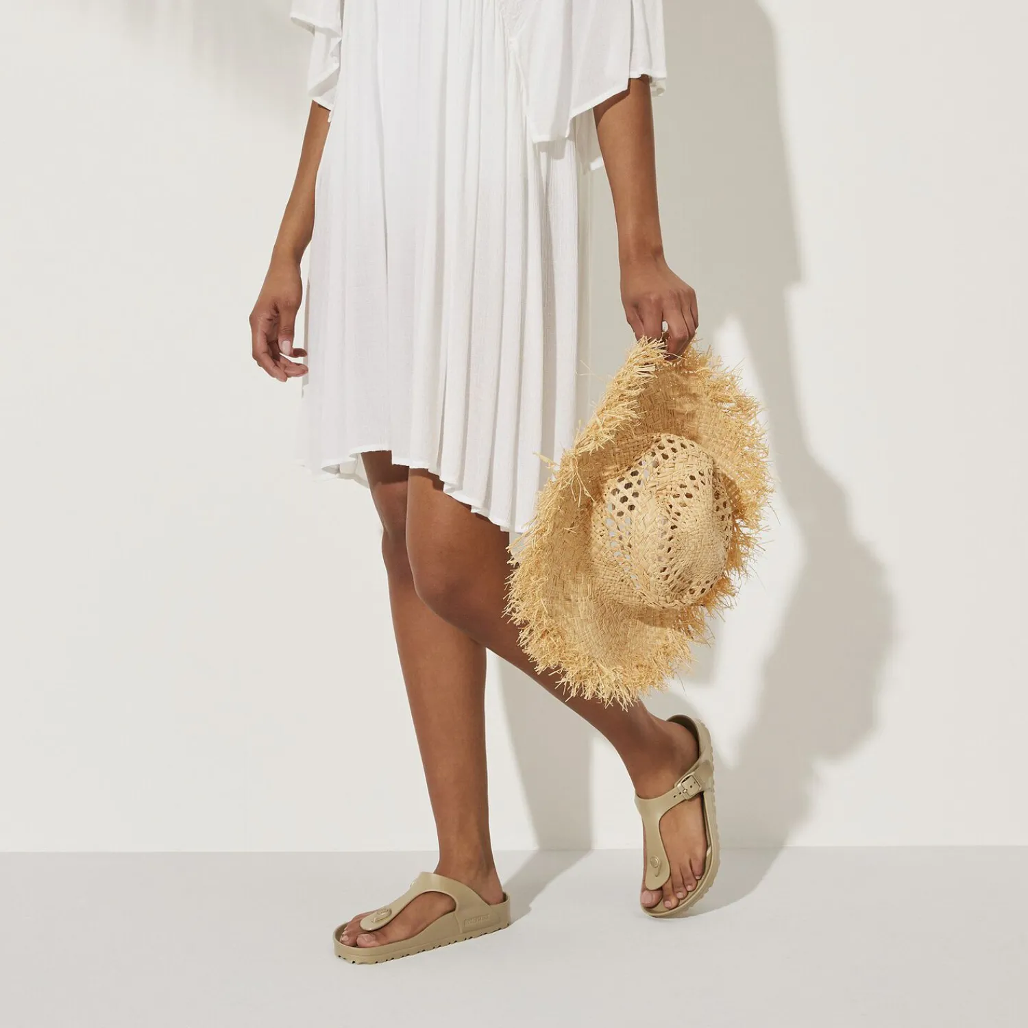 Shop Birkenstock Gizeh Essentials Glamour Gold